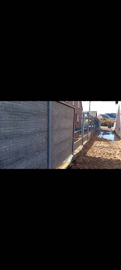 Pose de clôture béton